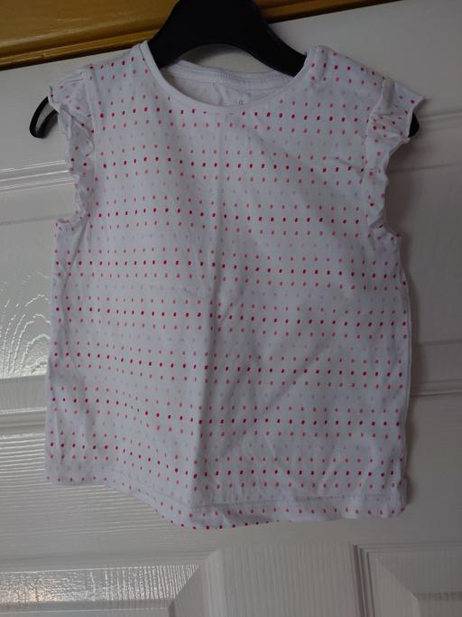  — Girls white spotty top size 12/18 months