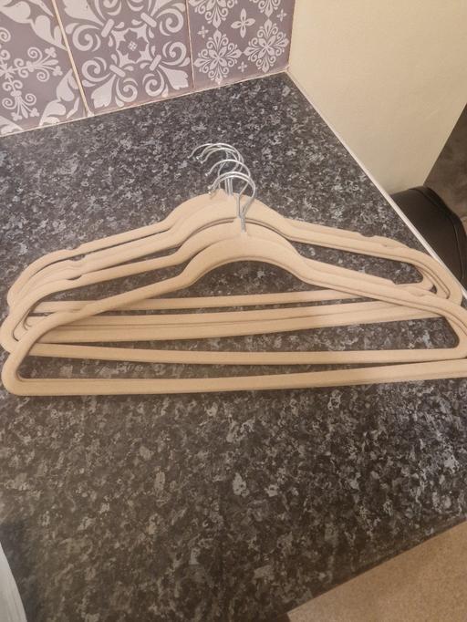  — brand new adult coat hangers