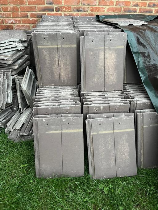  — Russell Roof Tiles