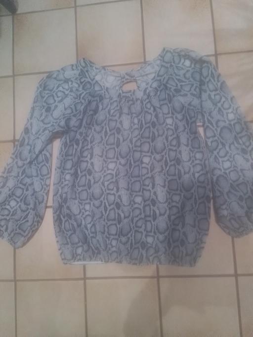  — LADIES TOP