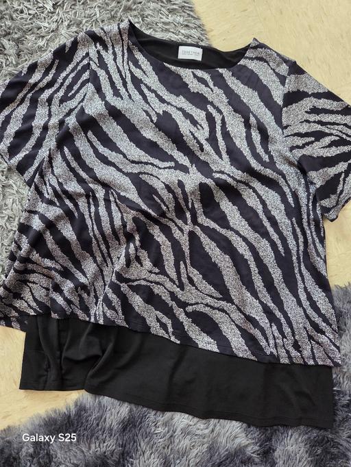  — ladies top