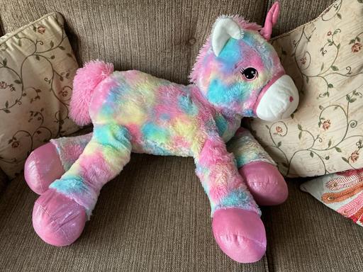  — Large pink unicorn soft toy