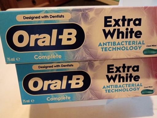  — 2 boxes of Oral B toothpaste sets
