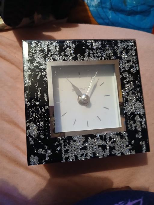  — small clock battery