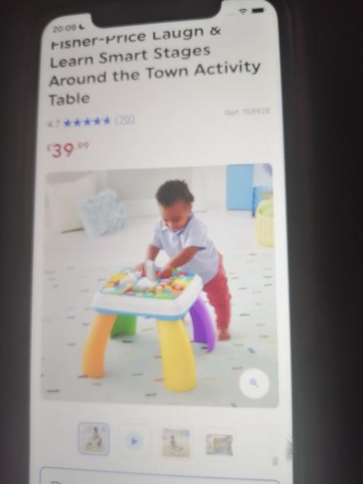  — Fisher Price learn around the town table