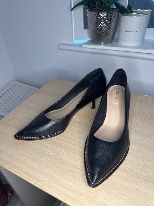  — Clarks black leather heels size 7 low heel