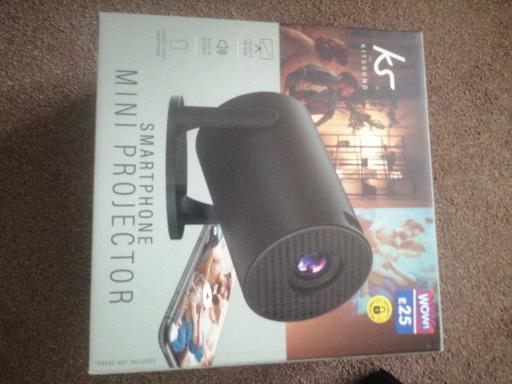  — New smartphone mini projector