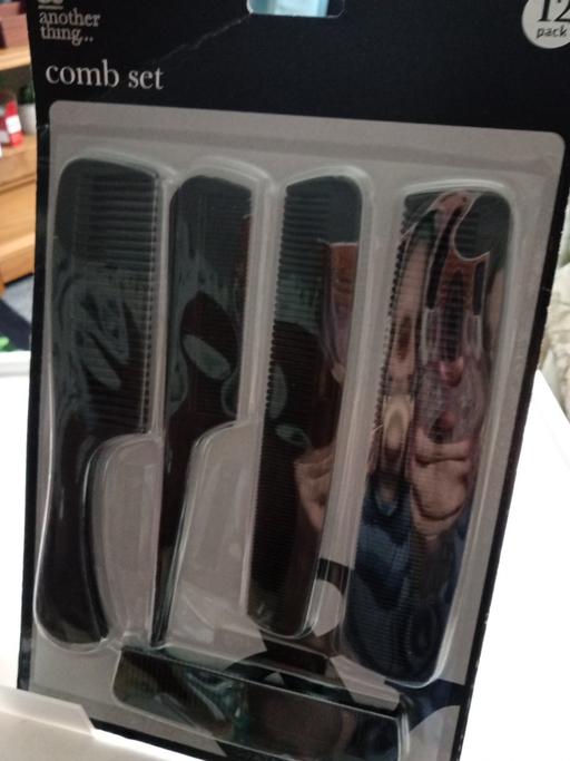  — new pack of 12 Hair combs