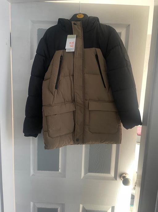  — Coat