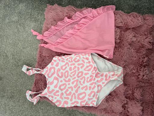  — Swimming costume with mesh skirt