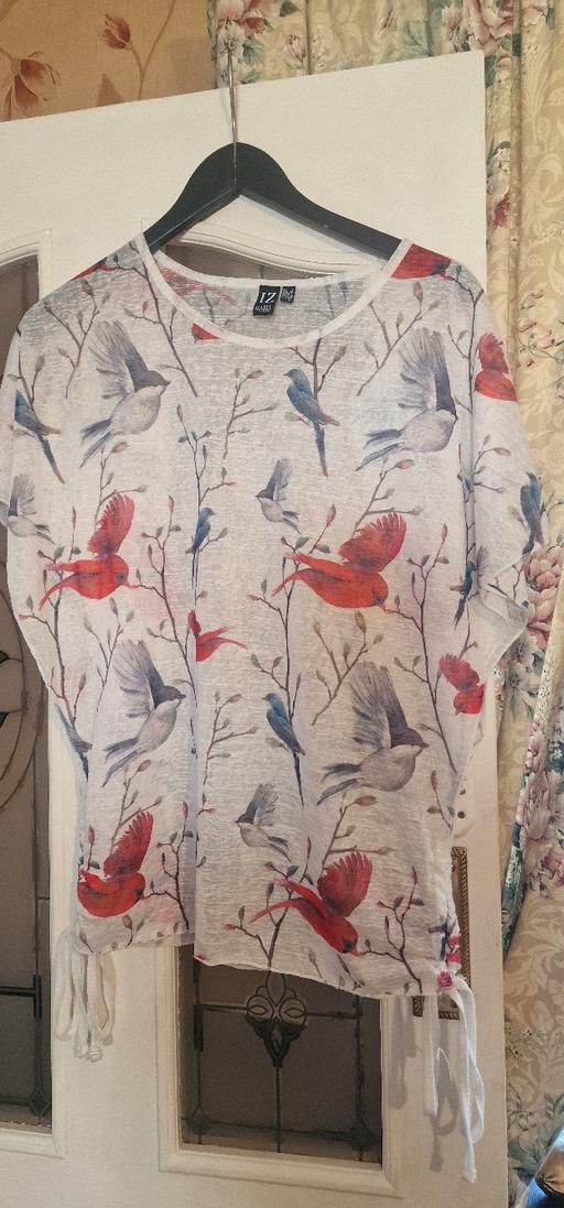  — ladies top