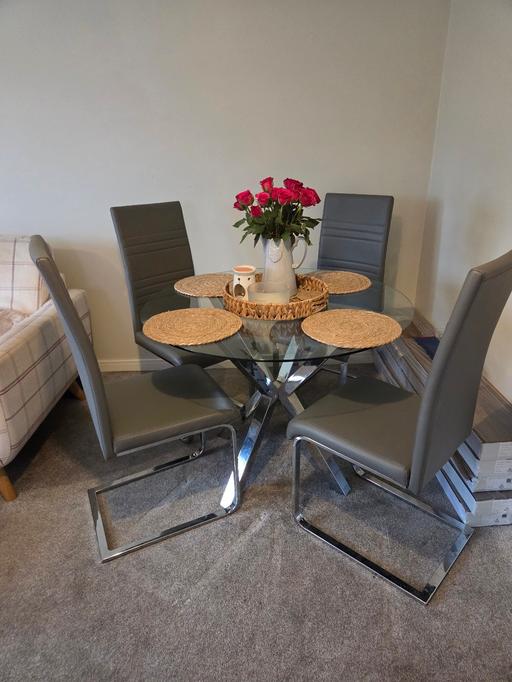  — Dining Table and Chairs