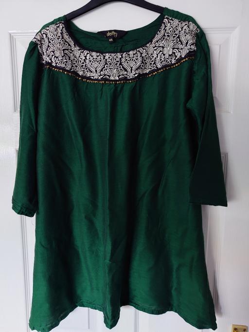  — Women's green top size 4XL