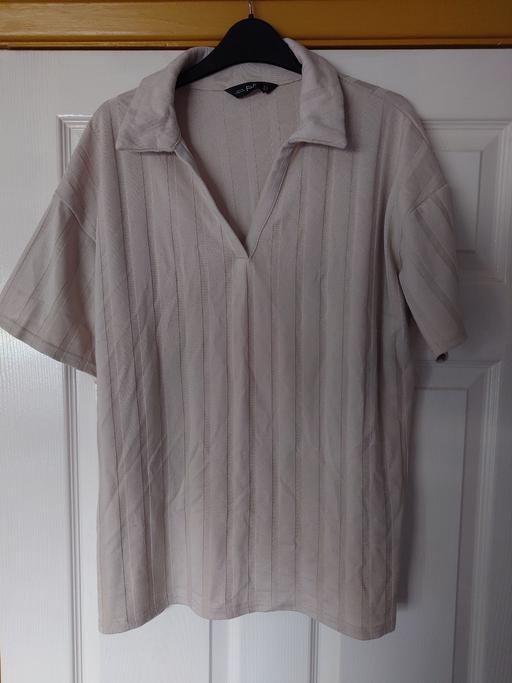  — Women's cream top size 14