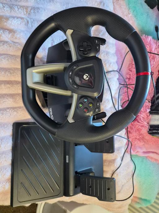  — xbox steering wheel and pedals.