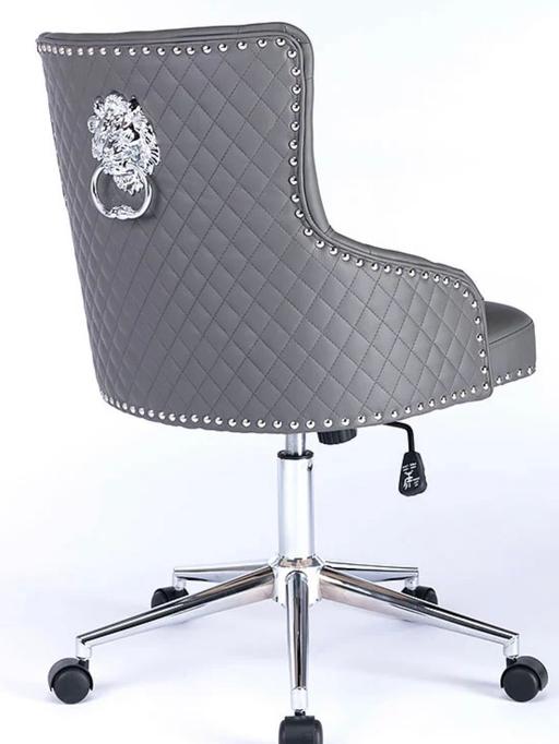  — Swivel Chair Grey with buttons silver