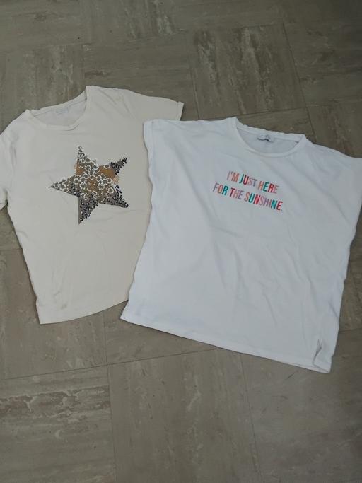  — 2 Tishirts S/10.