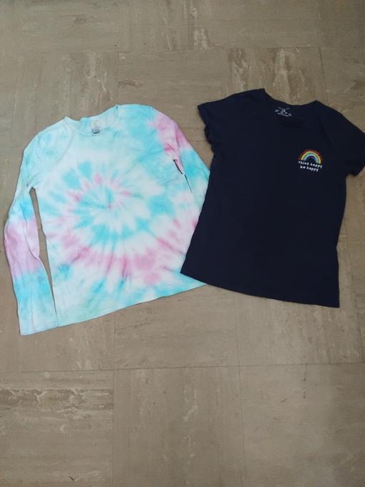  — 2 Tops XS.