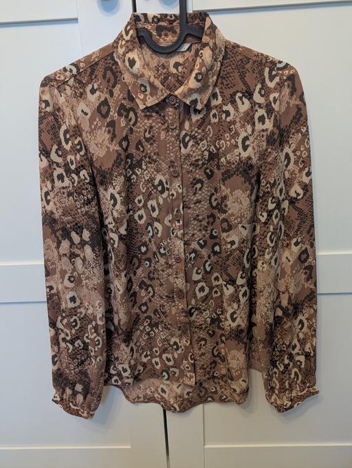  — Leopard print blouse