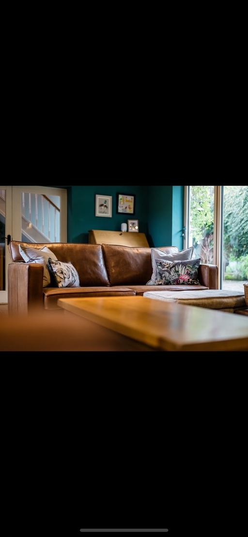  — Leather settee