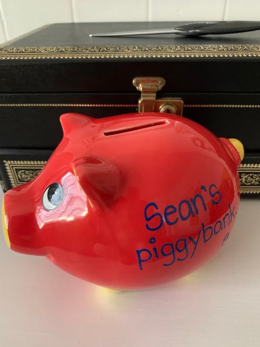  — Piggy bank buyer collect