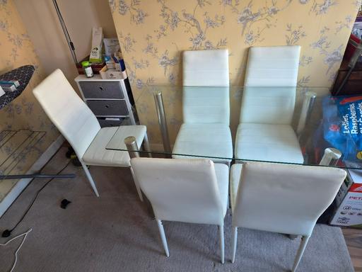  — dining table and chairs