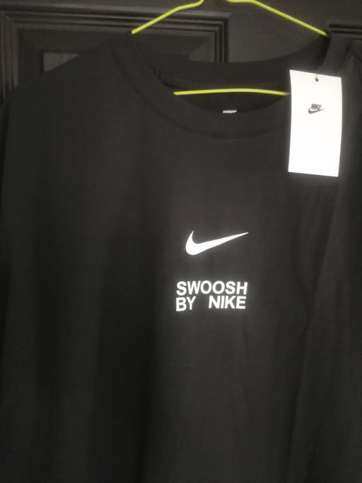  — Nike top brand new