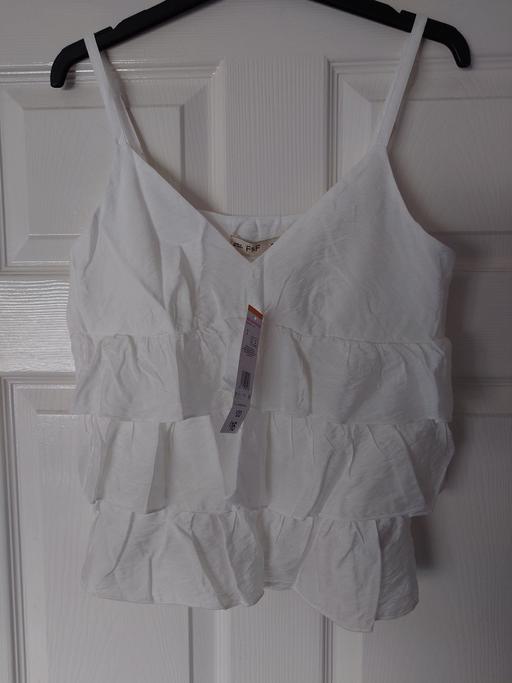  — Women's white ruffle strap top size 6