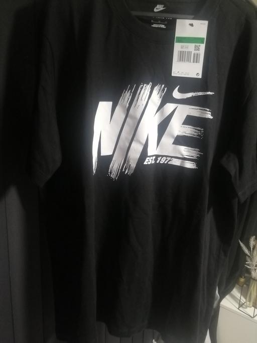  — Nike top new