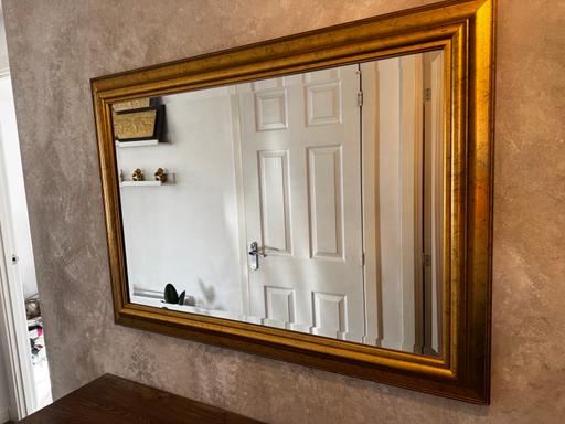  — Large gold mirror