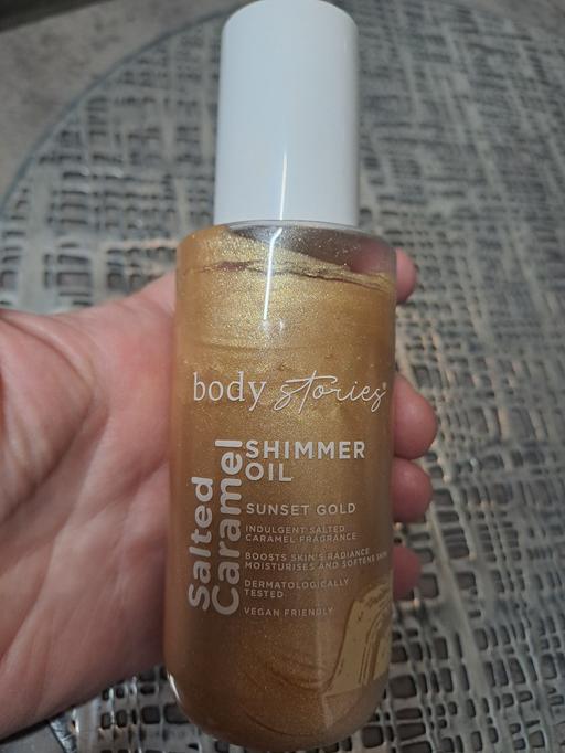  — body shimmer oil