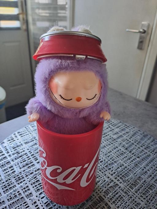  — decorative la bu but in coke can