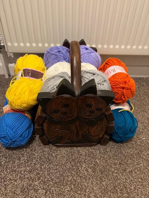  — Carved wooden basket & 12 wool