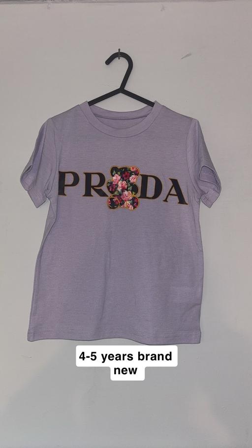  — Girls T-shirt purple size 4-5 years