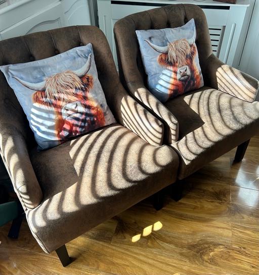  — Two faux suede chairs