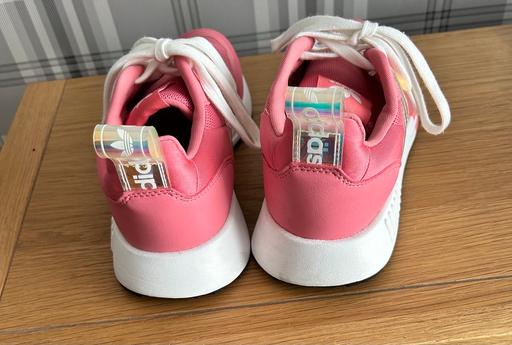  — Women’s pink adidas trainers