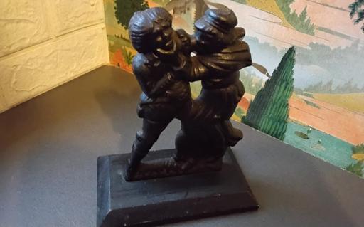  — old cast iron door stop damaged