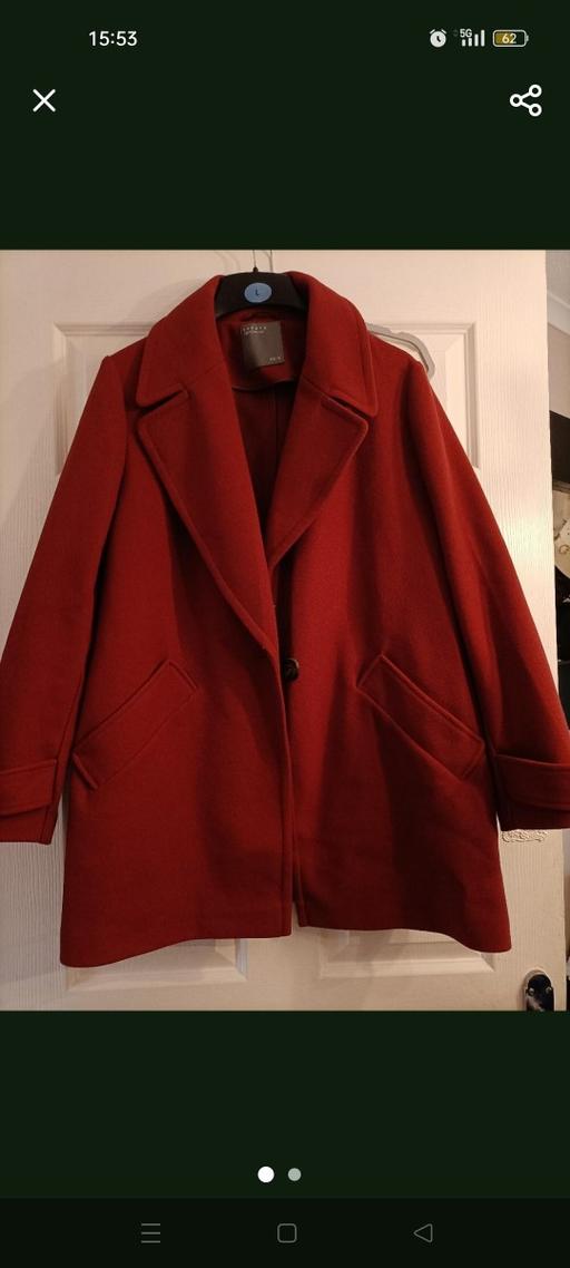  — rust coloured coat size 16