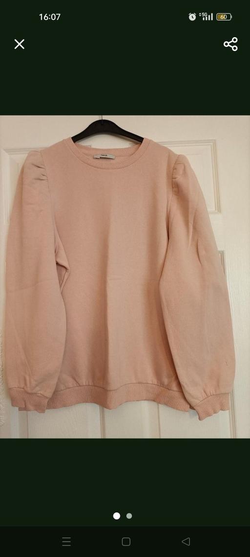  — pink sweater size 14