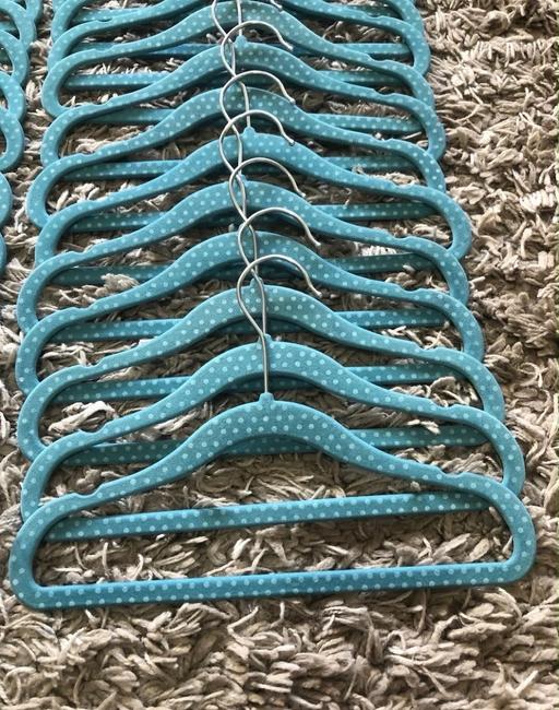  — 42 children’s coat hangers