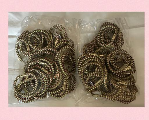  — 100 hair bobbles