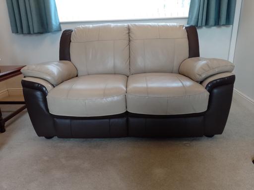  — 2 x leather 2 seater sofa 1 with electric rec