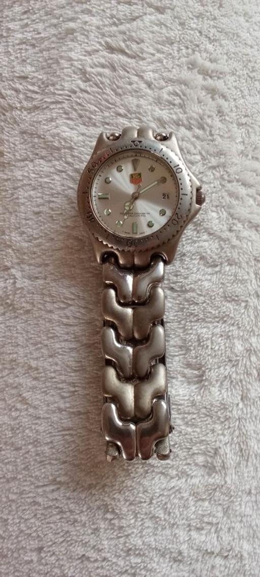  — Stainless steel watch