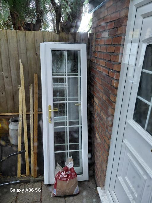  — Two Patio Doors..75 inch tall 24 inch wide wi