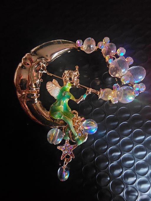  — brooch Angel on moon blowing bubbles