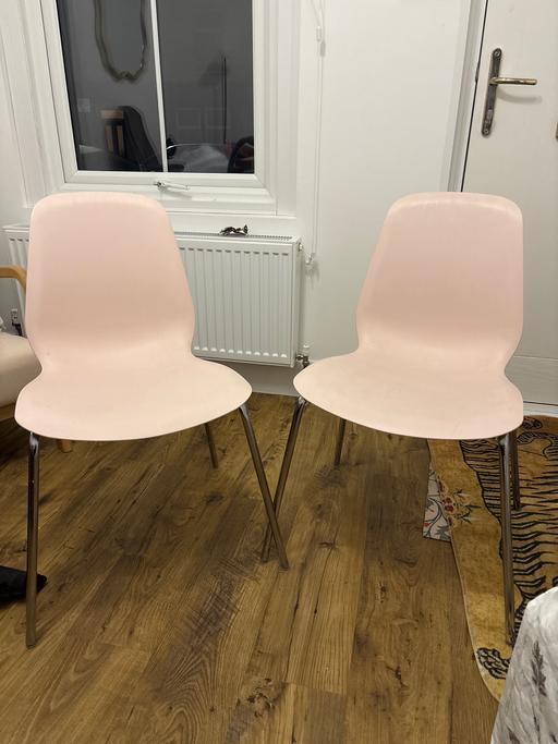  — Two stackable chairs