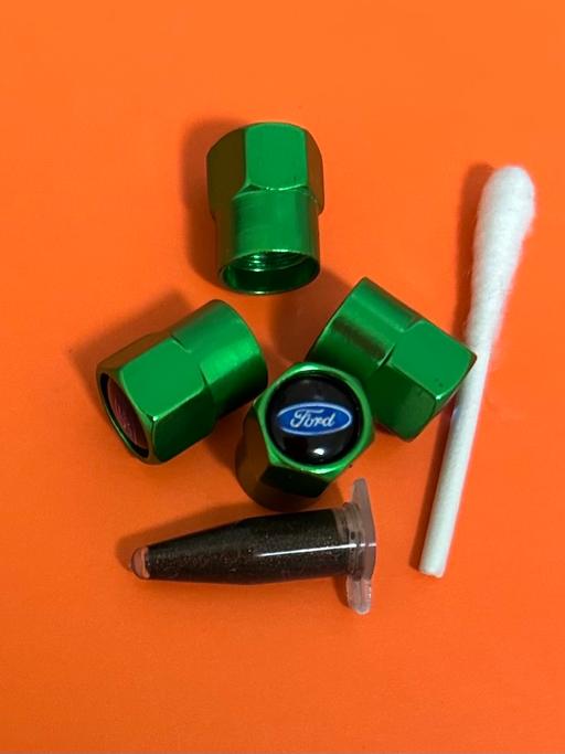  — Ford Tyre valve caps with grease