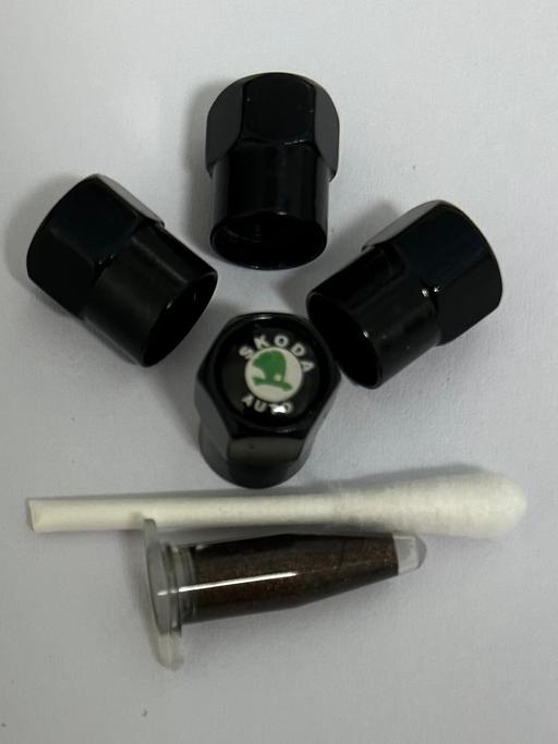  — Skoda tyre valve caps with grease