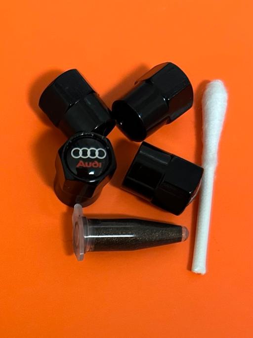  — Audi Tyre valve caps with grease