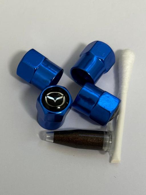  — Mazda Tyre valve caps with grease